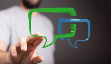 Sohbet baloncuklarına dokunan adam: iletişim ve sosyal medya kavramı