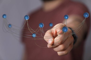 İnsan eliyle tutulan bağlı küreler ağ kavramı
