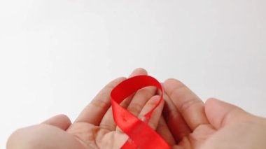Aralık Dünya AIDS Günü için kırmızı kurdele, bağışıklık yetmezliği sendromu, çoklu miyelom kanseri farkındalığı ayı ve Ulusal Kırmızı Kurdele Haftası. Sağlık ve Dünya Kanseri