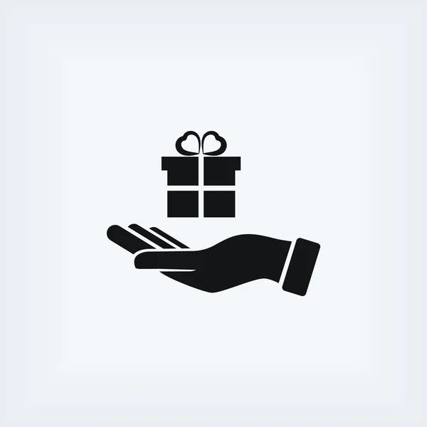 Kéz- és ajándékok ikon — Stock Fotó