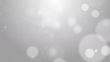 Parçacıklar iş beyaz parlak glitter bokeh toz soyut arka plan döngüsü