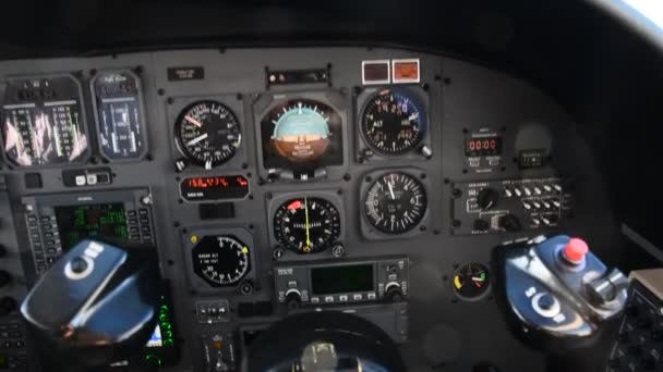 Pilot in an airplane cockpit, airplane instruments — Stock Video