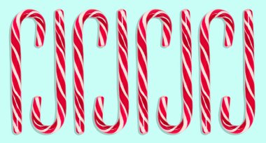 Mavi arka planda izole edilmiş şeker kamışlarının yakın çekimi.