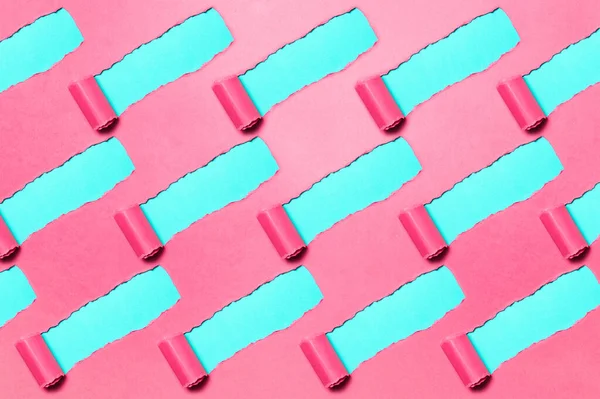 Pattern Diagonally Torn Pink Paper Blue Background — Stock Fotó