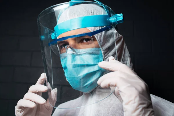 Dark Close Portrait Young Doctor Wearing Ppe Suit Coronavirus Covid — Stockfoto