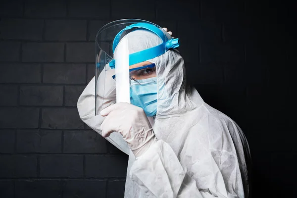 Side Portrait Young Doctor Wearing Ppe Suit Coronavirus Covid Background — Stockfoto