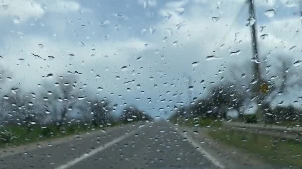 Unstable Camera Natural View Raindrops Front Car Window Traffic Time — Stock Video