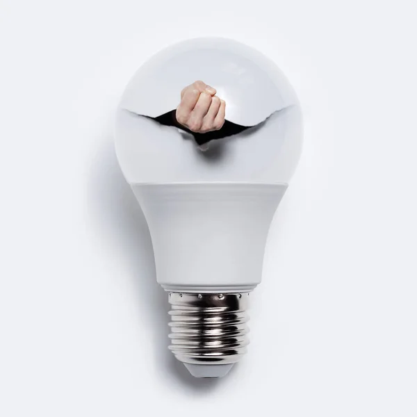 Close Human Fist Smash Torn Hole Light Bulb White Background — Stock Photo, Image