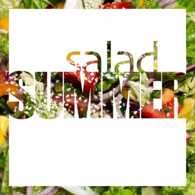 Summer salad, text on background of vegetarian salad and white color.