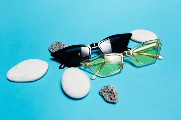 Close Modern Two Sunglasses Yellow Black Color White Grey Stones — Stok fotoğraf