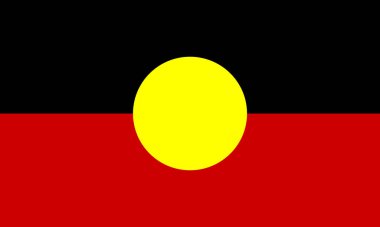 Siyah üst yarısı, kırmızı alt yarısı ve sarı çemberi olan Aborjin Avustralyalıların bayrağı. Yerli birliğinin, kimliğinin ve toprak bağlantısının sembolü.
