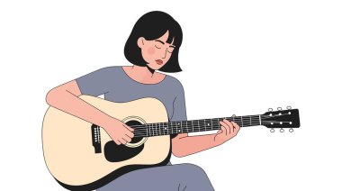 Kısa siyah saçlı bir kadın akustik gitar çalıyor, gözleri kapalı, oturduğu yerde..