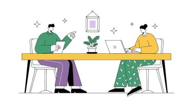 Masada çalışan iki kişinin görüntüsü. Biri dizüstü bilgisayar kullanıyor, diğeri tablet tutuyor ve işaret ediyor..