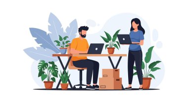 Resimli bir adam dizüstü bilgisayar kullanarak masada oturuyor ve elinde dizüstü bilgisayar tutan bir kadın saksı bitkileri ve karton kutularla çevrili..