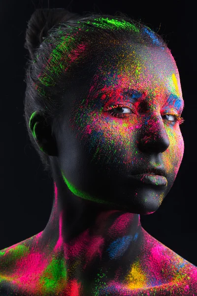 Menina com um corpo-arte preto e uma maquiagem colorida — Fotografia de Stock