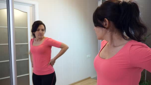 Young Woman Looks Mirror Her Body Checking Fat Disappointed Emotion — Stock Video