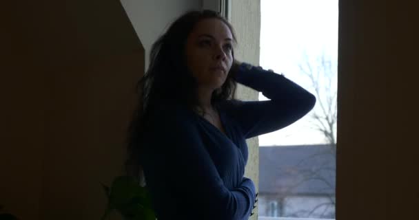 Distressed Woman Thinks Calms Relax Stress Standing Window Sad Emotions — Stock Video