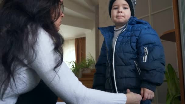 Mother Zipping Her Sons Warm Waterproof Children Jacket Little Child — Stock Video