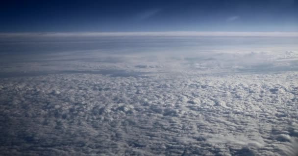 View Cloudy Blue Sky Porthole Window Passenger Jet Airplane Flying — Stock Video