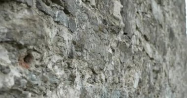 Taş Duvar Masonluğu 'na yakın çekim. Eski Ortaçağ Kalesi Kalesi. Tarihi Geziler 4K