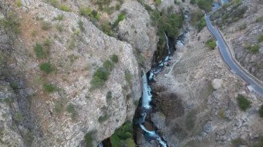 Waterfall rocky landscape. beautiful canyon, golden autumn. High quality 4k footage