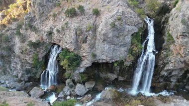 Waterfall rocky landscape. beautiful canyon, golden autumn. High quality 4k footage
