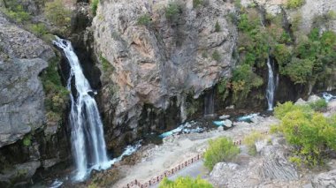 Waterfall rocky landscape. beautiful canyon, golden autumn. High quality 4k footage