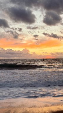 Beach sunset waves. stunning bright colorful sky, seascape. High quality 4k footage