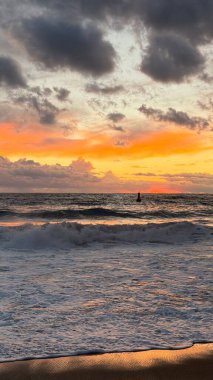 Beach sunset waves. stunning bright colorful sky, seascape. High quality 4k footage