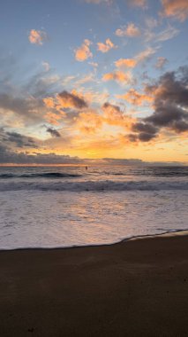 Beach sunset waves. stunning bright colorful sky, seascape. High quality 4k footage