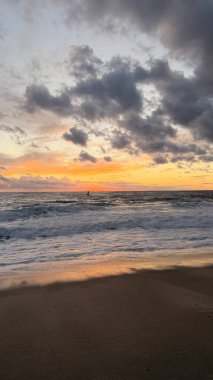 Beach sunset waves. stunning bright colorful sky, seascape. High quality 4k footage