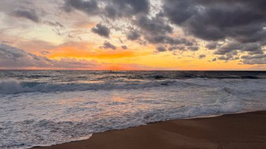 Beach sunset waves. stunning bright colorful sky, seascape. High quality 4k footage
