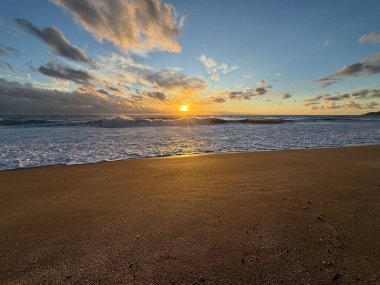 Beach sunset waves. stunning bright colorful sky, seascape. High quality 4k footage