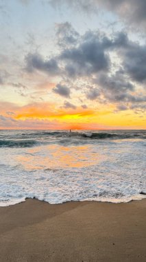 Beach sunset waves. stunning bright colorful sky, seascape. High quality 4k footage