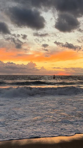 Beach sunset waves. stunning bright colorful sky, seascape. High quality 4k footage