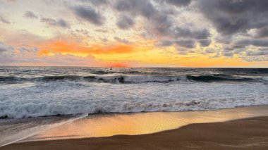 Beach sunset waves. stunning bright colorful sky, seascape. High quality 4k footage