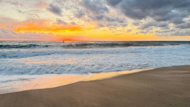 Beach sunset waves. stunning bright colorful sky, seascape. High quality 4k footage