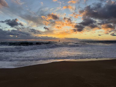 Beach sunset waves. stunning bright colorful sky, seascape. High quality 4k footage
