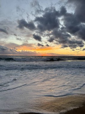 Beach sunset waves. stunning bright colorful sky, seascape. High quality 4k footage