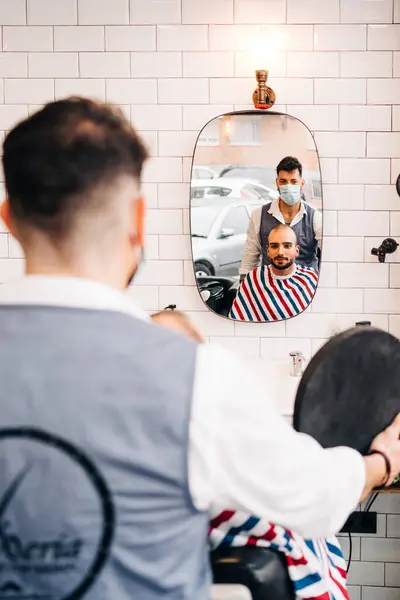 Back View Anonymous Male Hairstylist Mask Bearded Client Reflecting Mirror — Stock Fotó