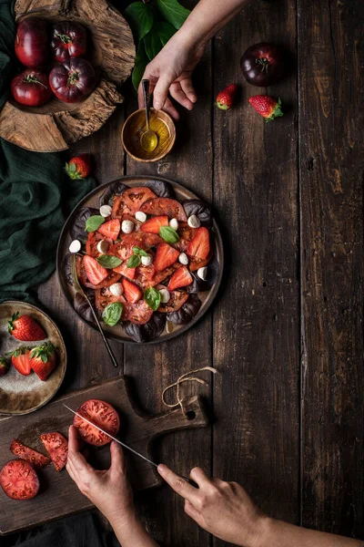 Anonymous People Preparing Healthy Tomato Strawberry Salad Wooden Rustic Table — Stock Photo, Image