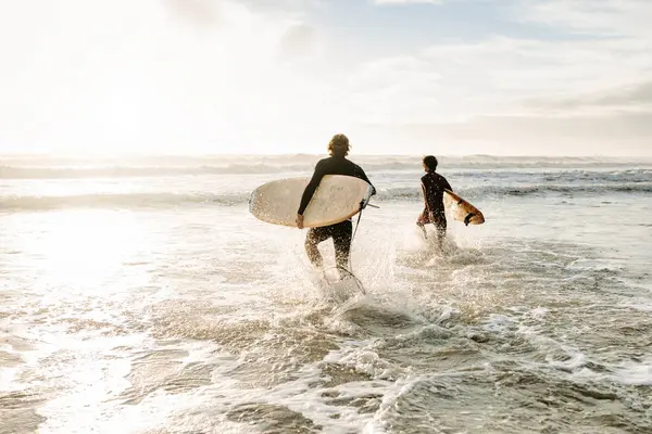 Back View Unrecognizable Male Surfer Friends Dressed Wetsuits Walking Surfboards — Stock Photo, Image