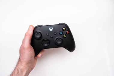 Joystick controller for playing on the new xbox series x console. Kiev, Ukraine - April 21, 2021 clipart