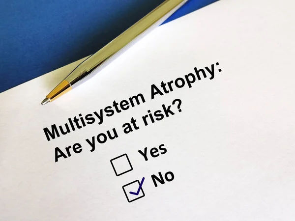 One person is answering question. The person is answering question about risk of multisystem atrophy.