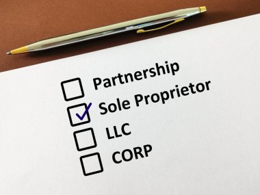 One person is answering question. He chooses sole proprietor. clipart