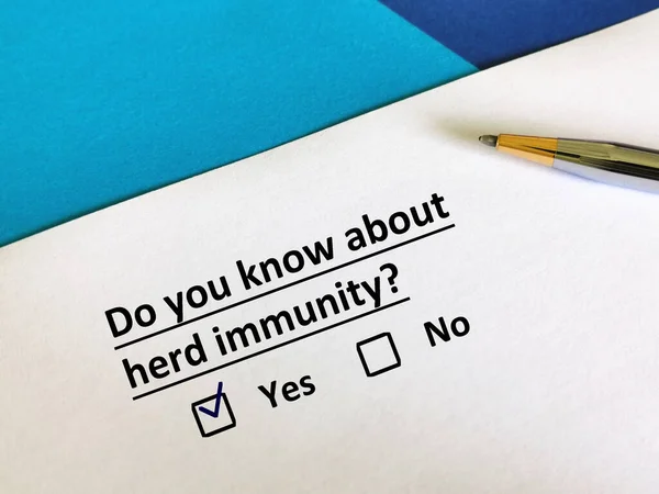 One person is answering question about pandemic.  He knows about herd immunity.