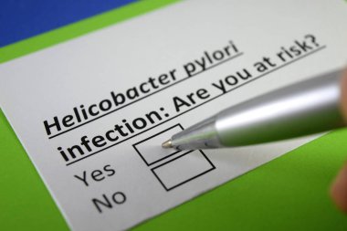 One finger is answering question about helicobacter pylori infection. clipart