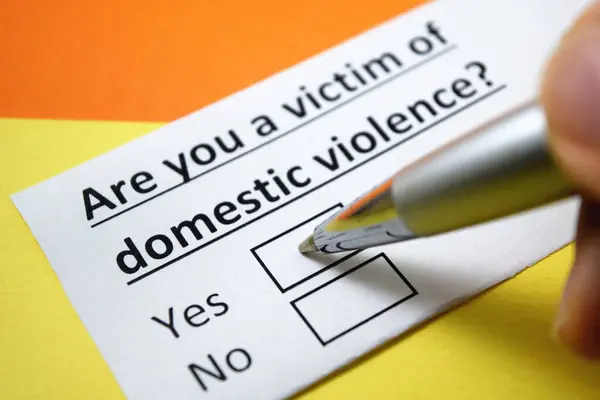 A person is answering question about domestic violence.