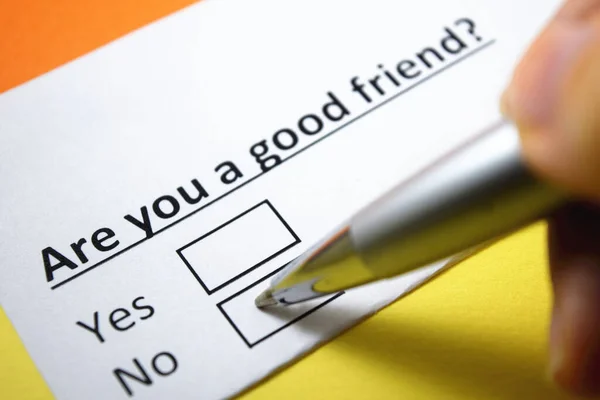 A person is answering question about good friend.