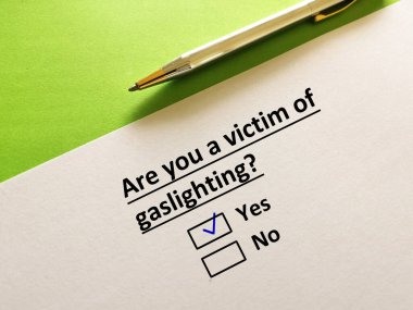 One person is answering question. The person is a victim of  gaslighting. clipart